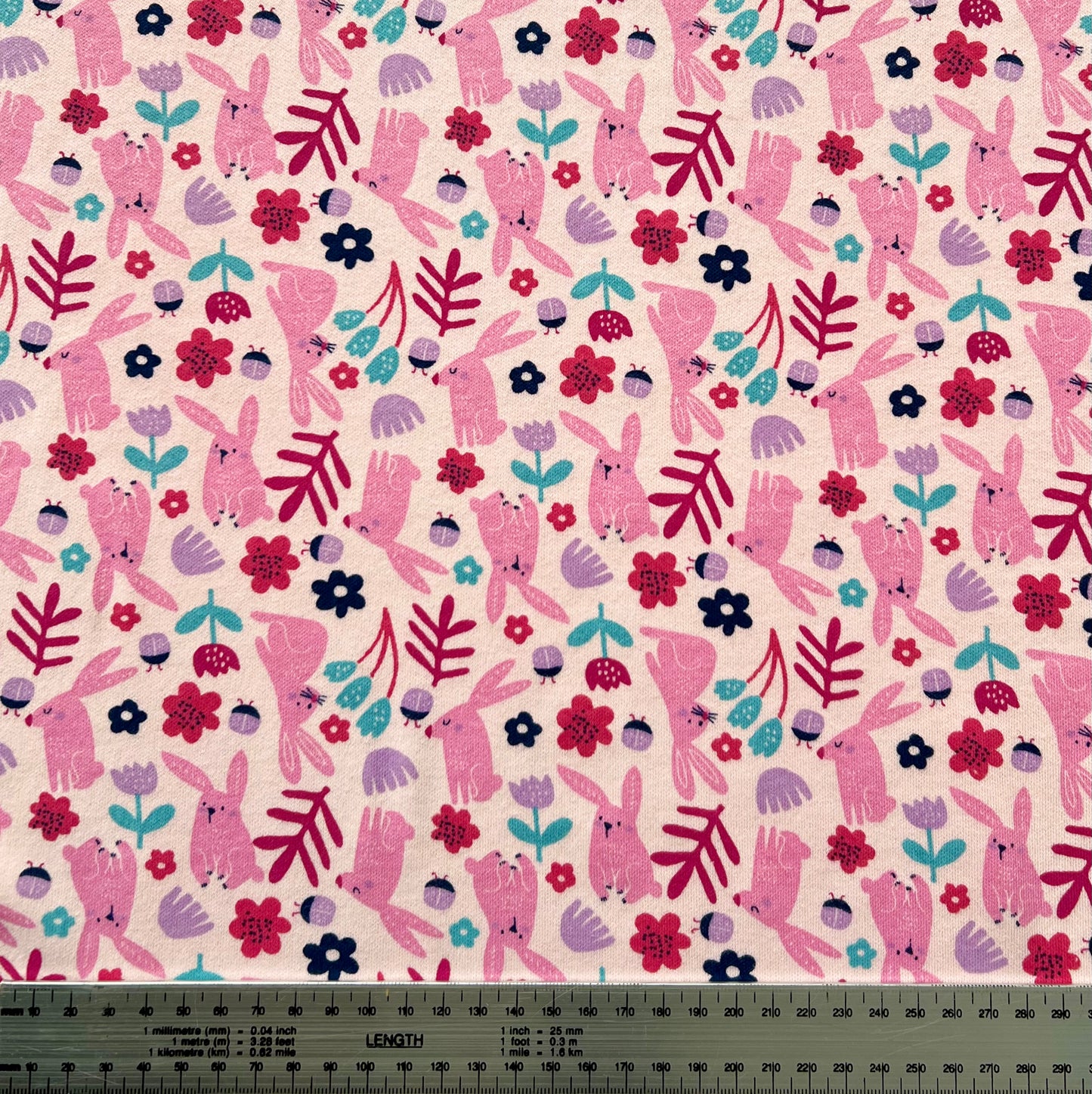 Interlock 30/1 Conejos Fondo Rosa