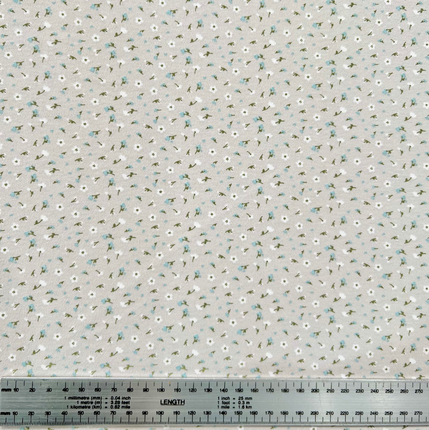 Interlock 30/1 Florcitas Fondo Gris