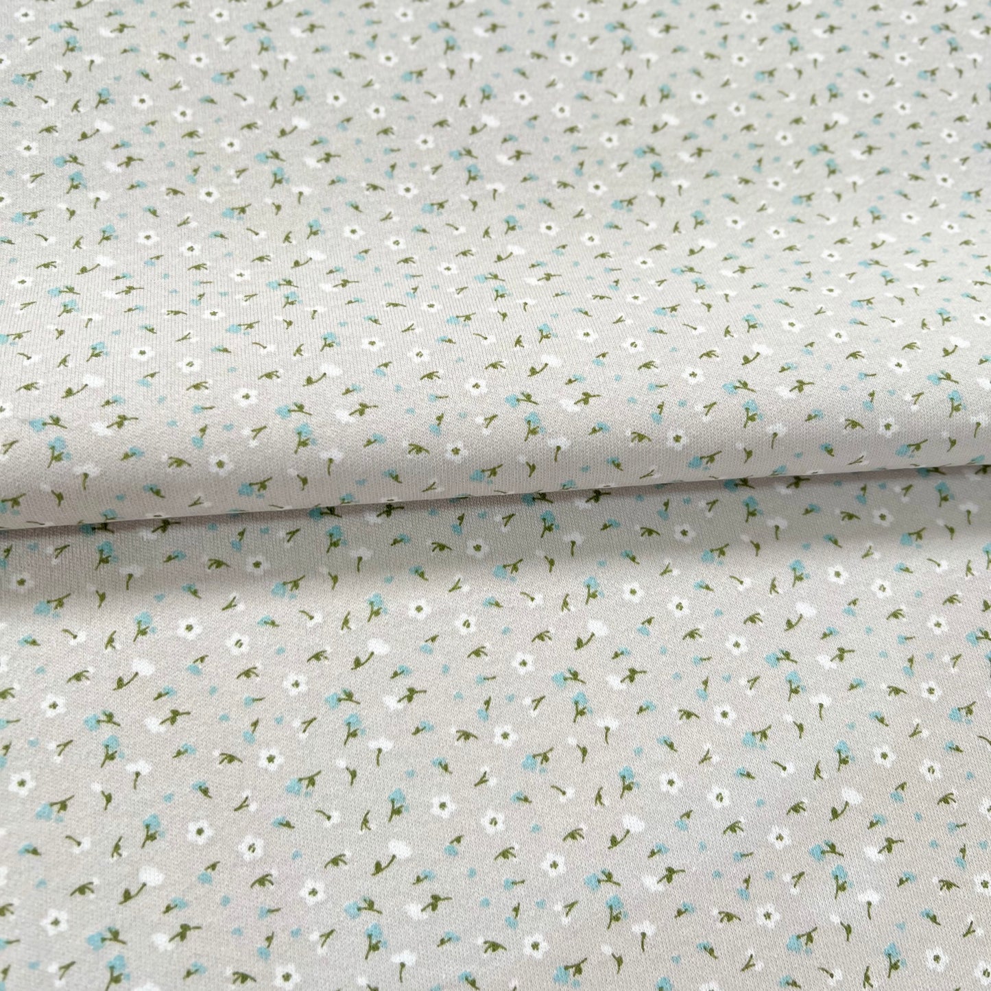 Interlock 30/1 Florcitas Fondo Gris
