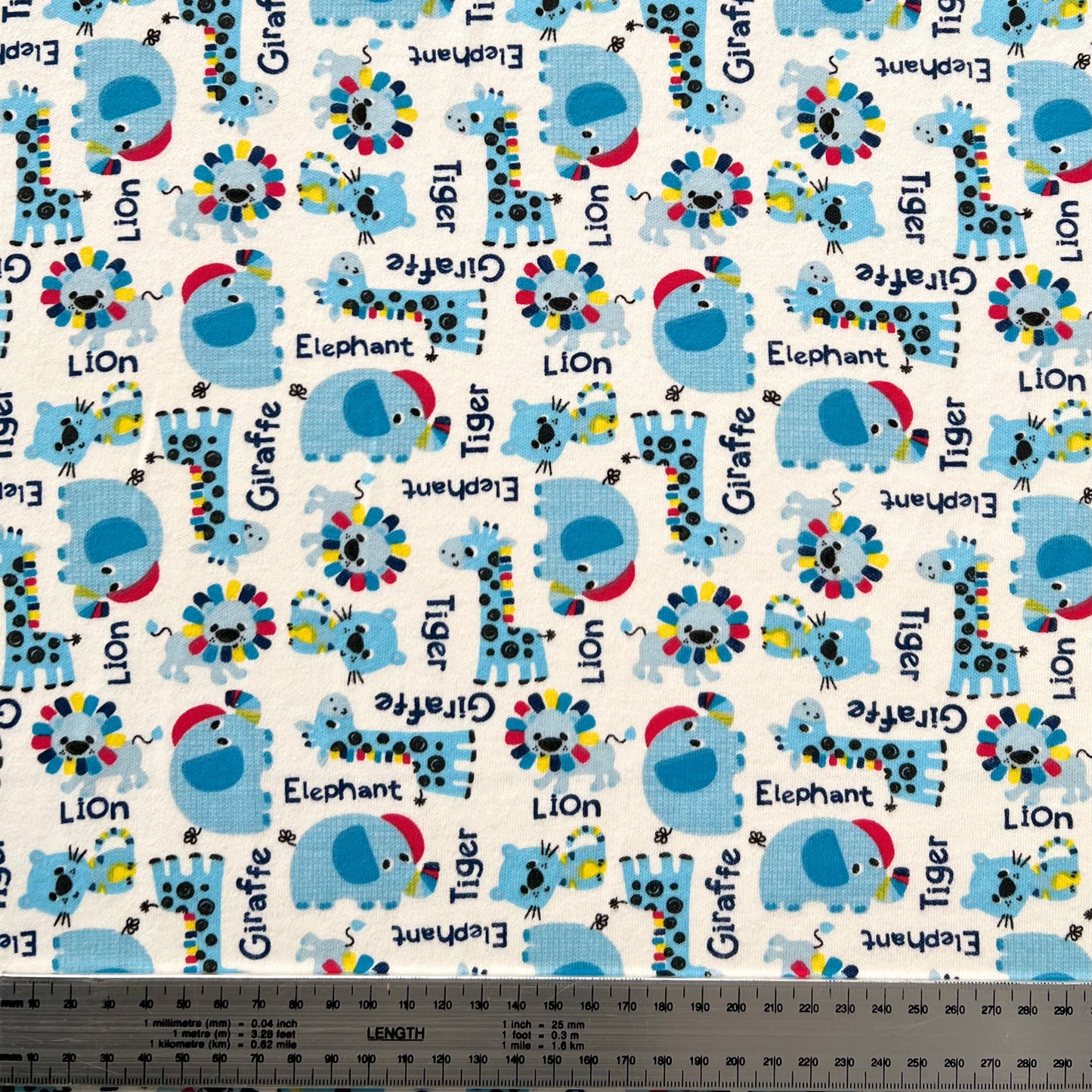 Interlock 30/1 Elefantes y Jirafas Azul