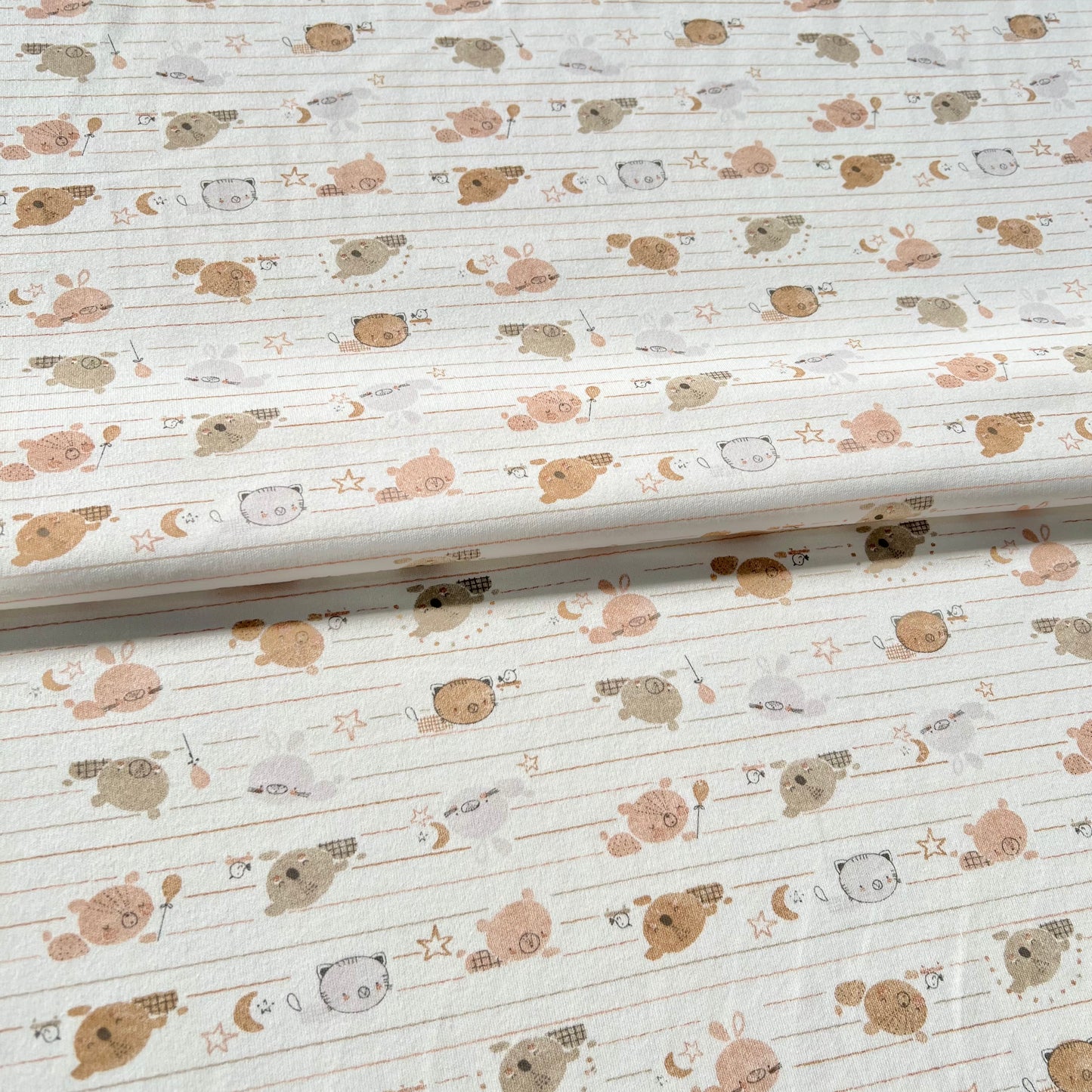 Interlock 30/1 Animalitos Linea Fondo Natural