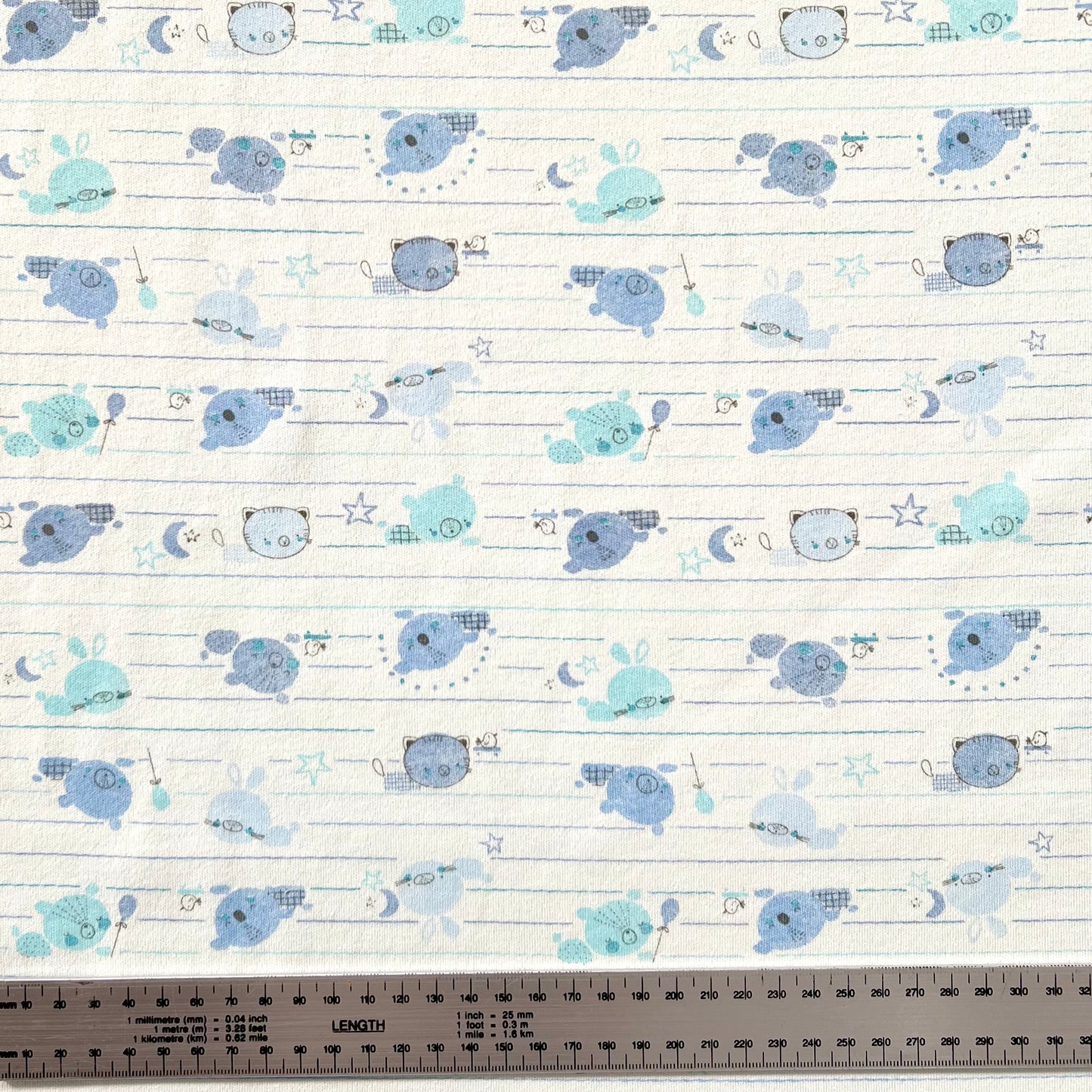 Interlock 30/1 Animalitos Linea Fondo Celeste