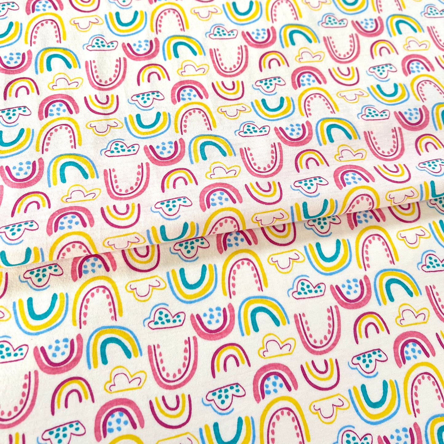 Jersey 30/1 Arcoiris Fondo Rosa