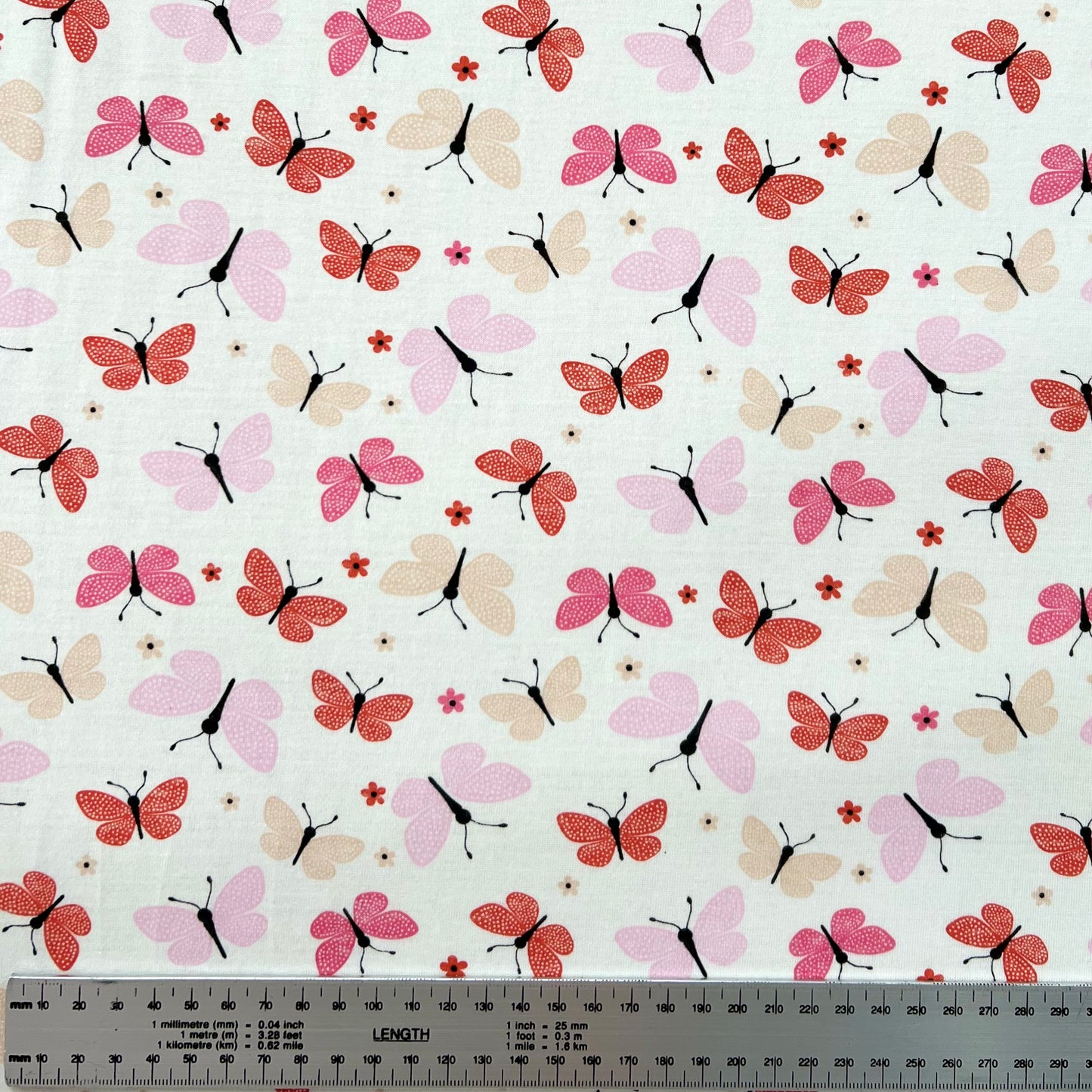 Jersey 30/1 Mariposas Fondo Blanco