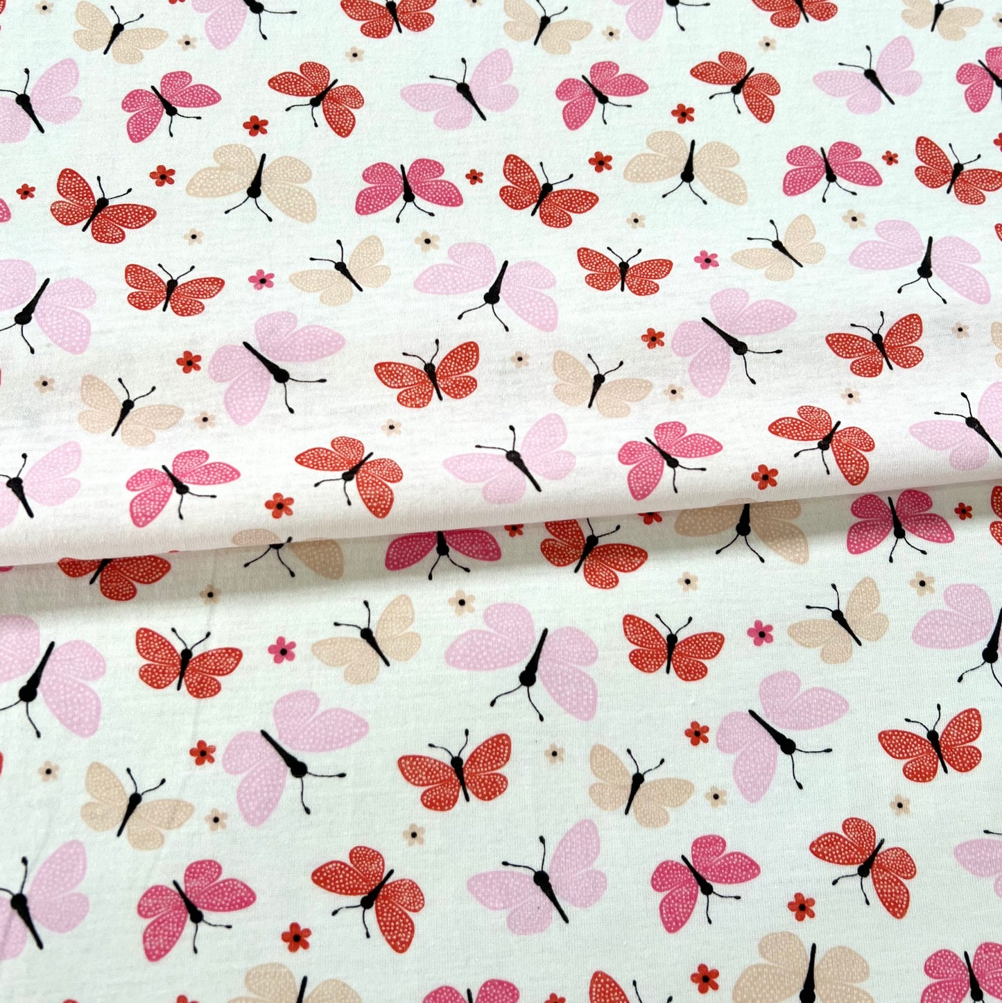Jersey 30/1 Mariposas Fondo Blanco