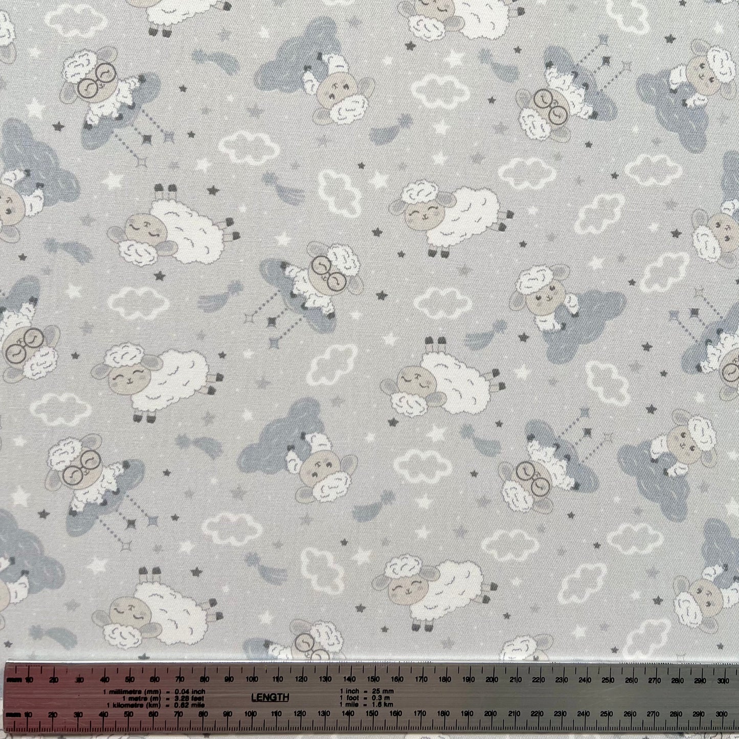 Gabardina Ovejitas Gris