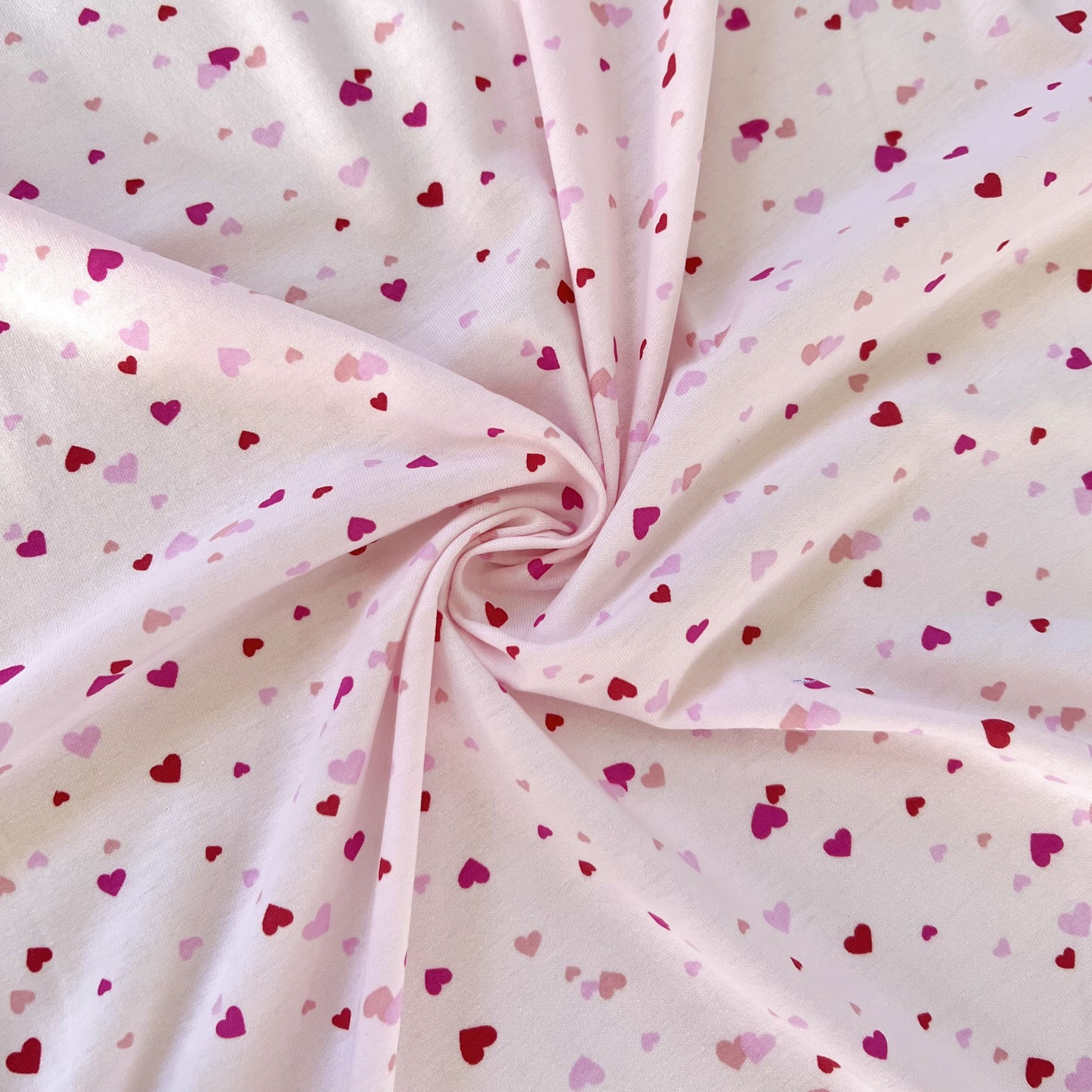 Jersey 30/1 Lluvia de Corazones Rosa