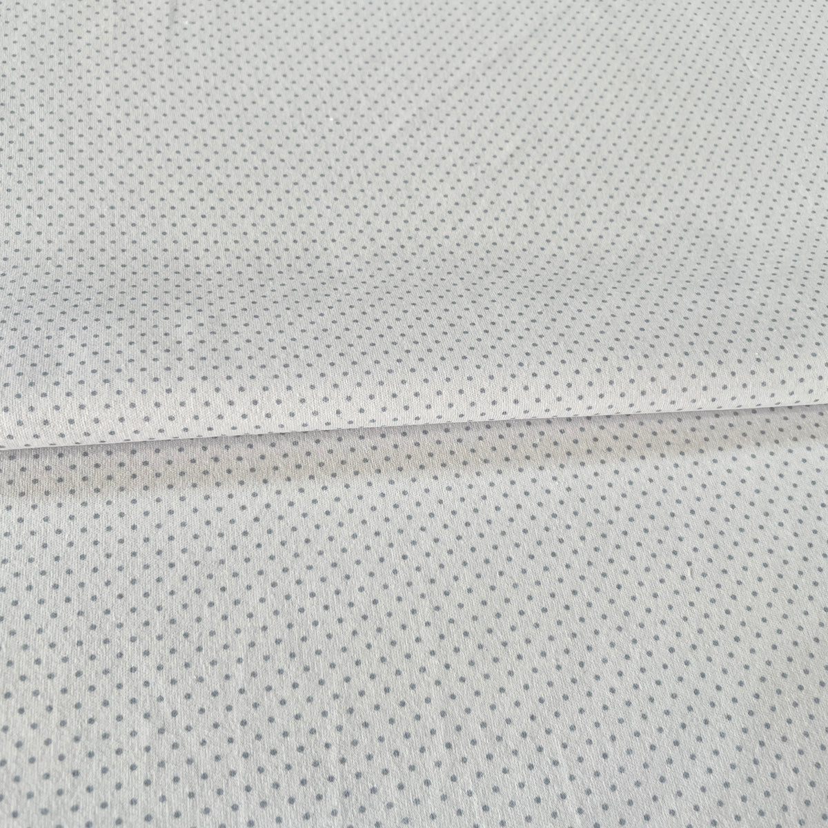 Interlock 30/1 Puntitos Gris