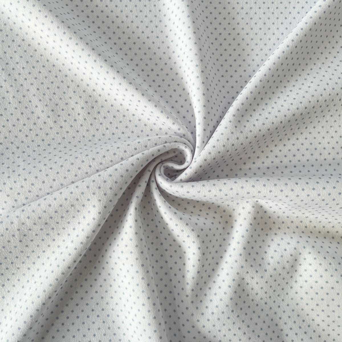 Interlock 30/1 Puntitos Gris