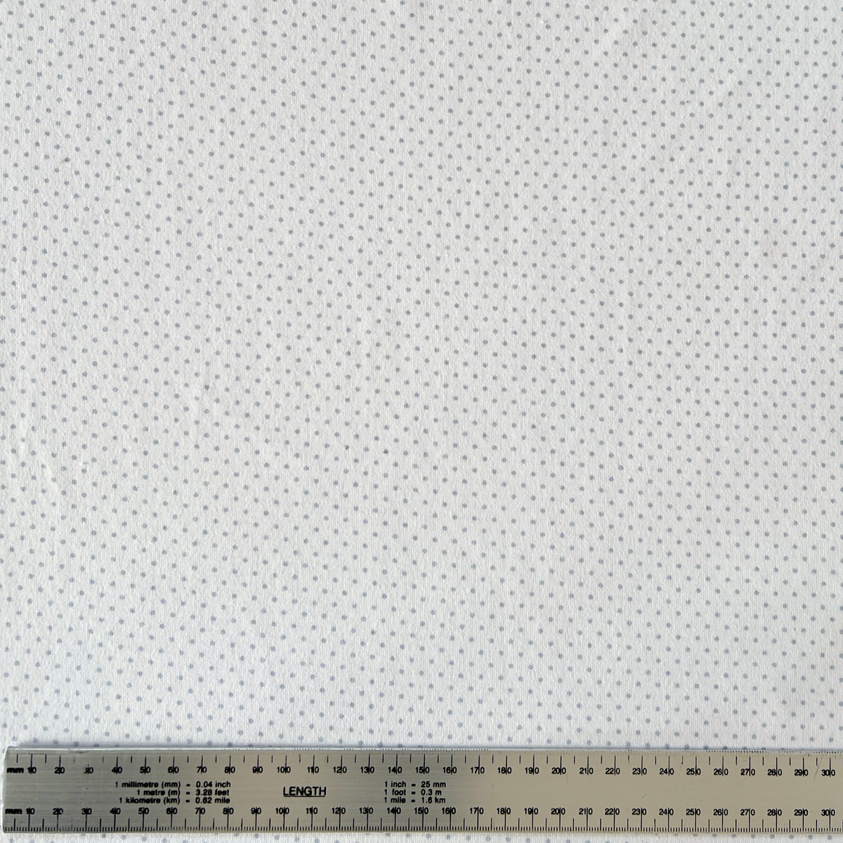 Interlock 30/1 Puntitos Gris