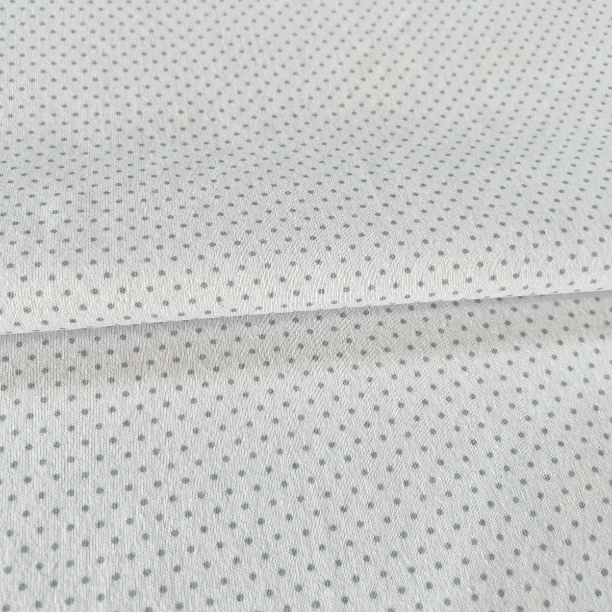 Interlock 30/1 Puntitos Gris
