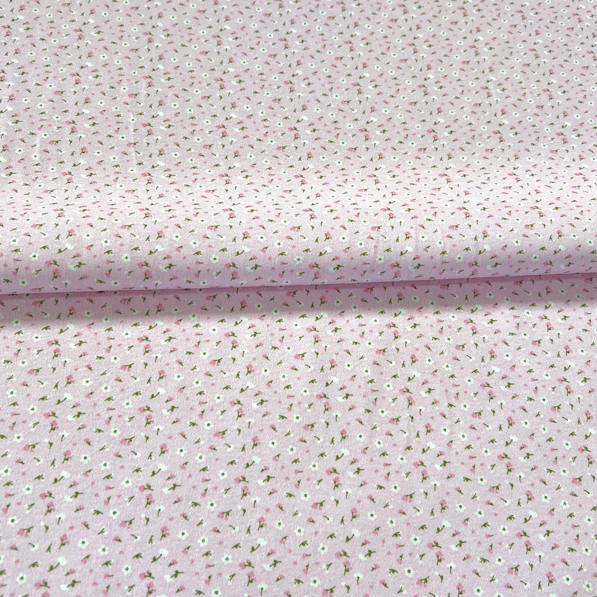 Jersey 30/1 Florcitas Fondo Rosa