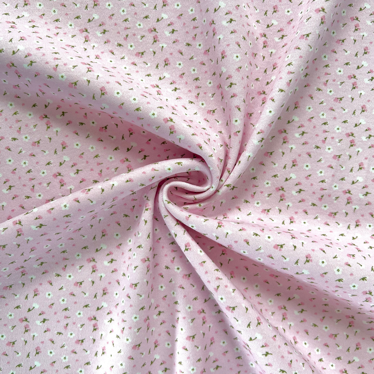 Jersey 30/1 Florcitas Fondo Rosa