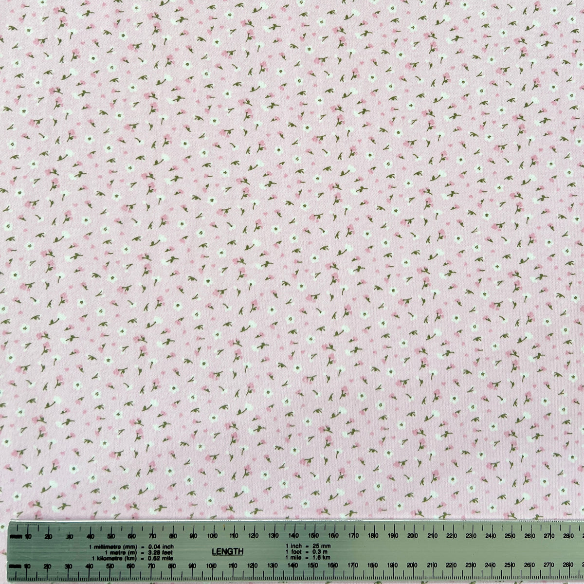 Jersey 30/1 Florcitas Fondo Rosa