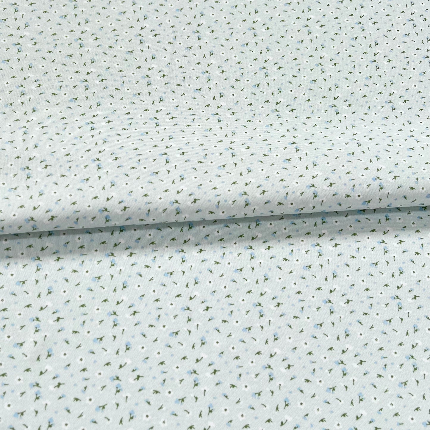 Interlock 30/1 Florcitas Fondo Celeste