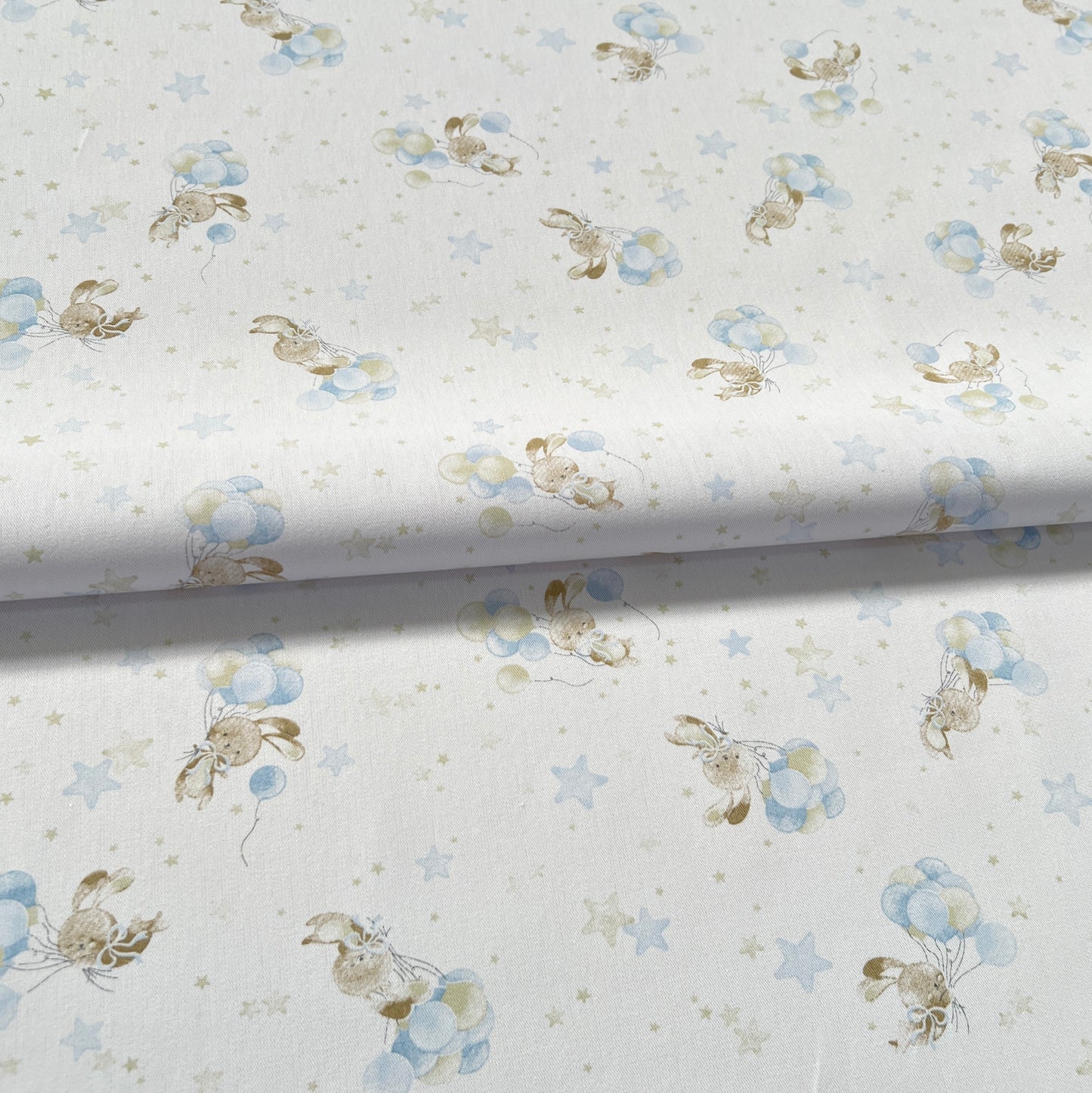Gabardina Conejitos Celeste