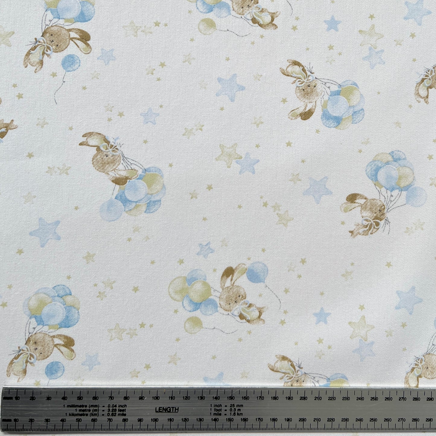 Gabardina Conejitos Celeste