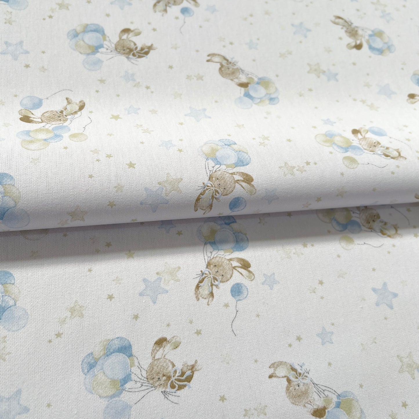 Gabardina Conejitos Celeste