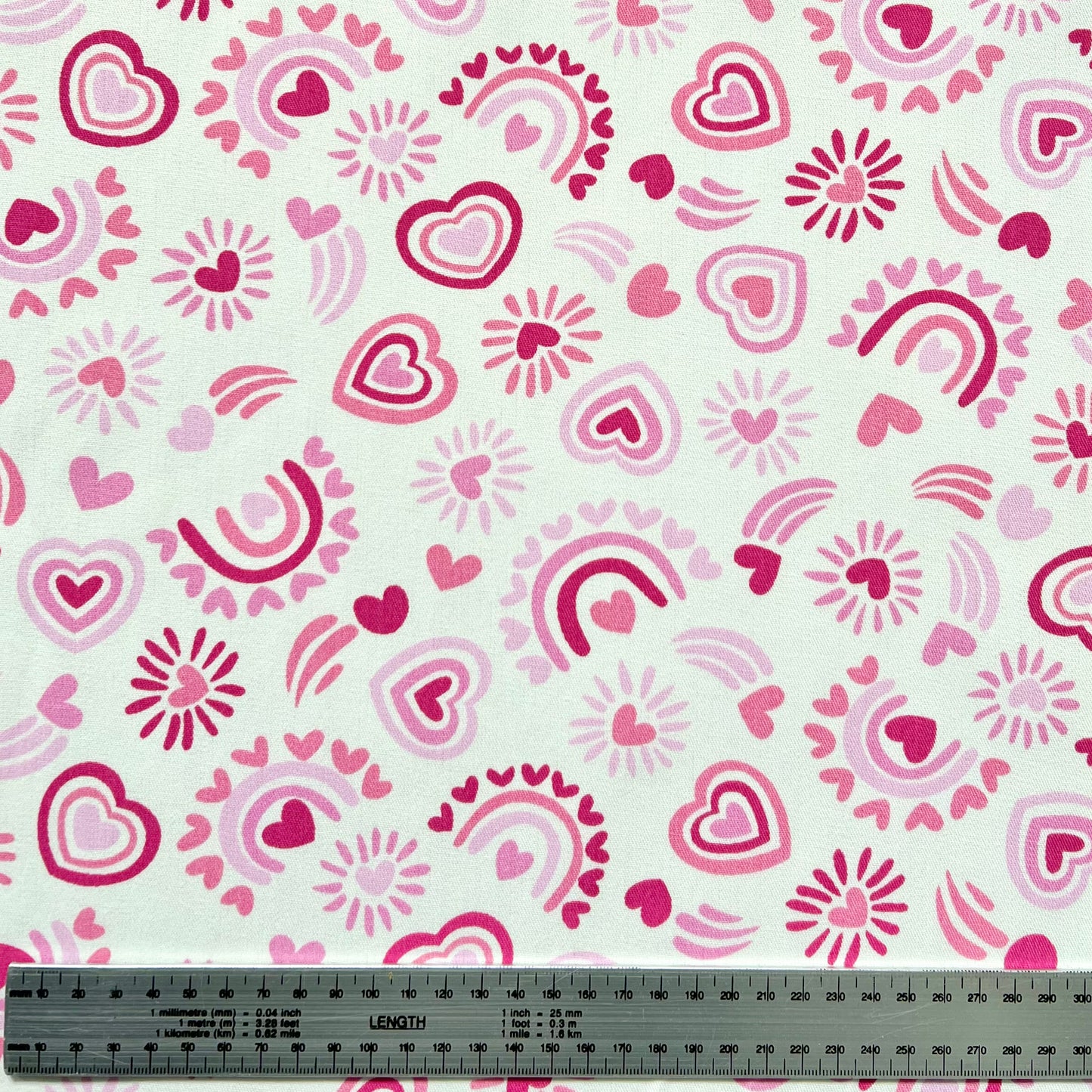 Gabardina Corazones Rosa