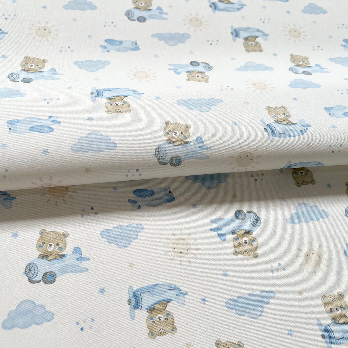 Gabardina Aviones Celeste