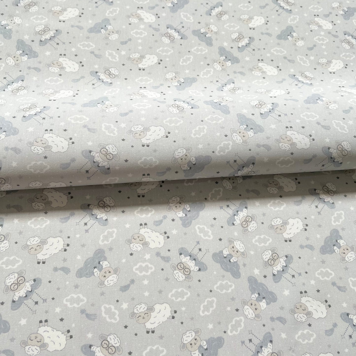 Gabardina Ovejitas Gris